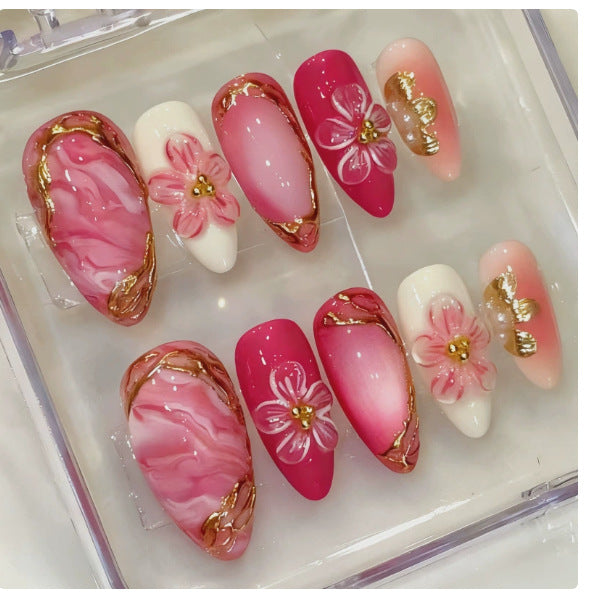 Acrylic nail set with floral accents and glitter details Kalsten