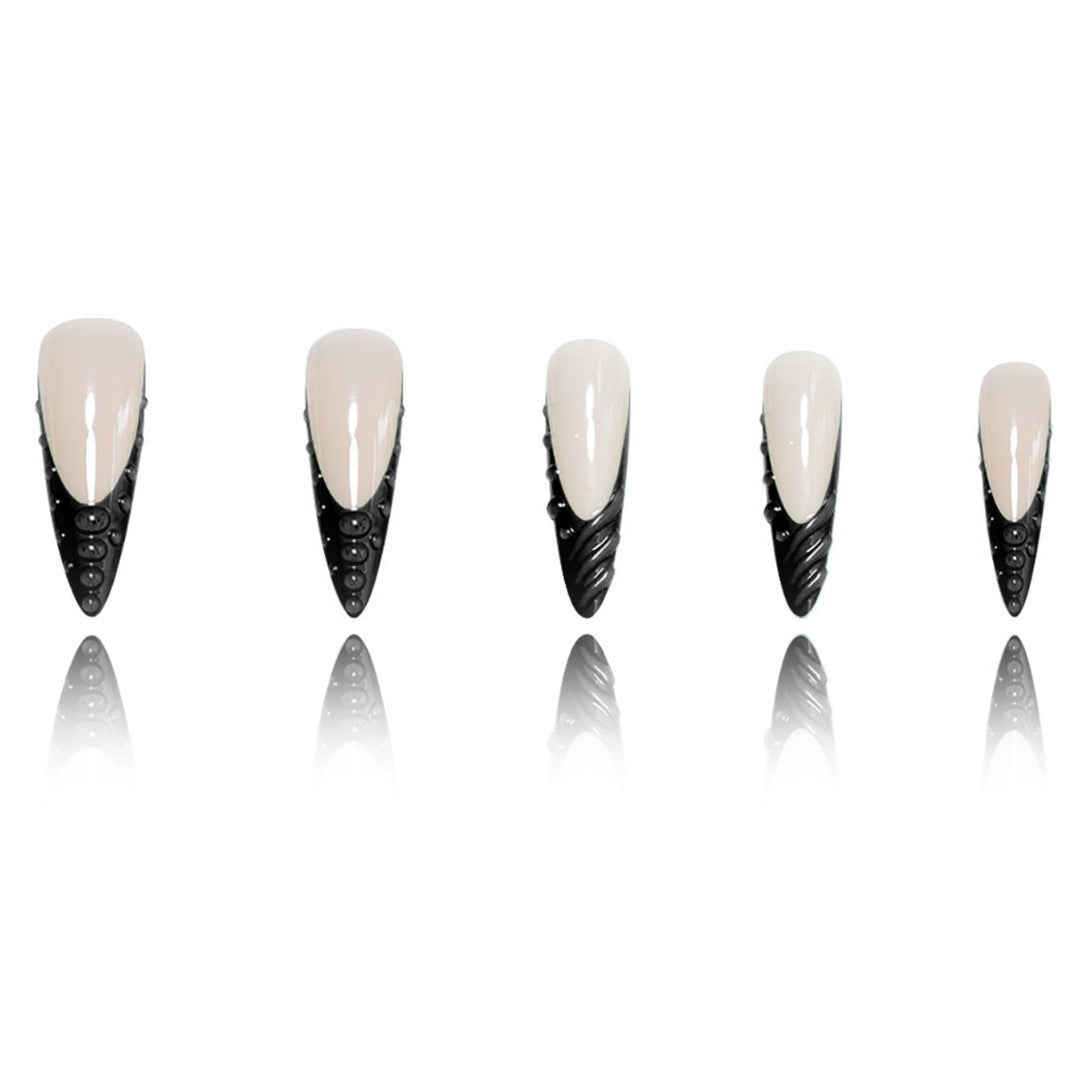 Artistic Stiletto Nail Extensions with Textured Detailing Kalsten