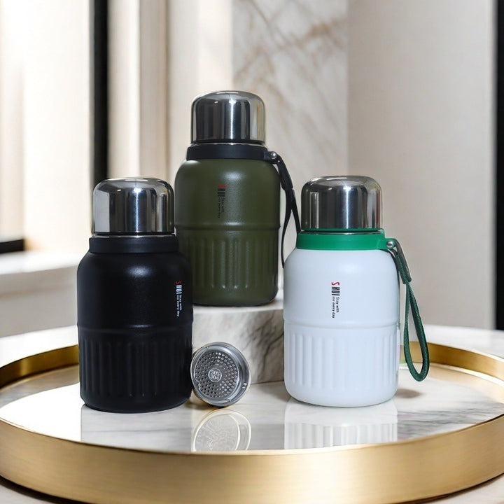 Insulated thermos bottle with practical drinking cup and sturdy carrying strap Kalsten