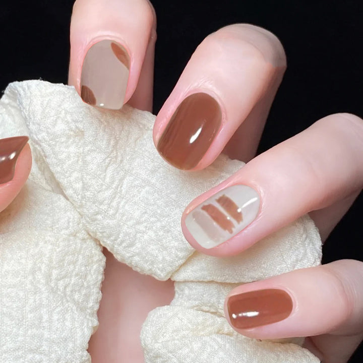 Artful nail extensions with an elegant leaf pattern Kalsten