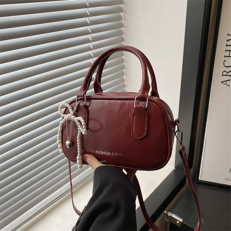 Elegant Pearl-Embellished Handheld Satchel
