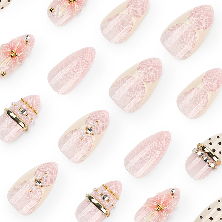 Artful Nail Extensions with Elegant Floral and Glitter Accents Kalsten