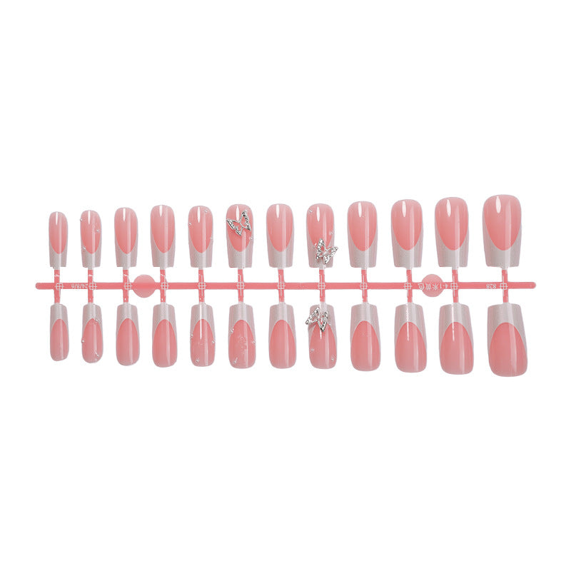 Nail art set with intricate designs and butterfly appliqués Kalsten