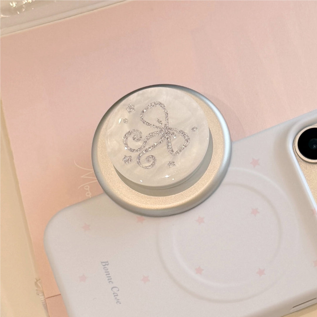 Stylish smartphone finger holder with glitter bow design Kalsten