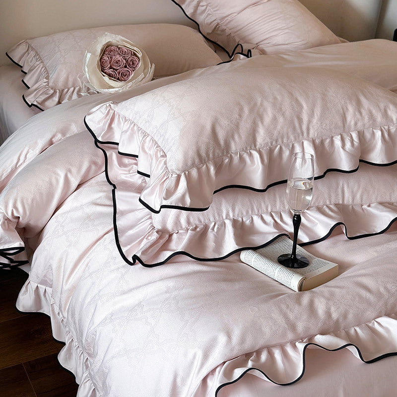 Luxurious cotton satin bedding set with ruffles and contrasting piping