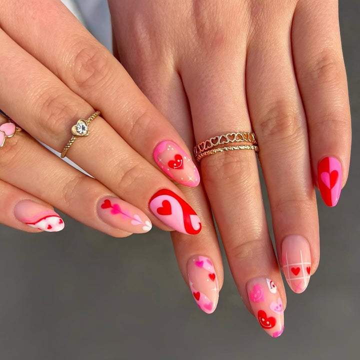 Acrylic nail set with romantic heart motifs and modern designs Kalsten