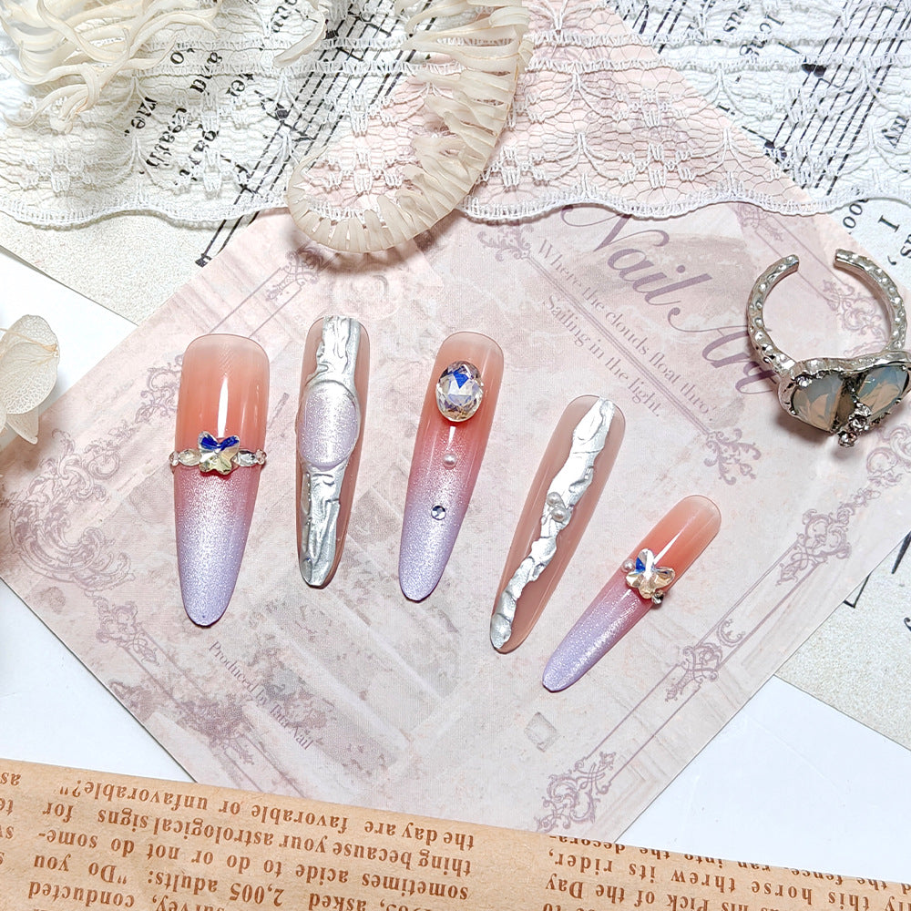 Artificial nails with elegant ombre design and jewelry accents Kalsten