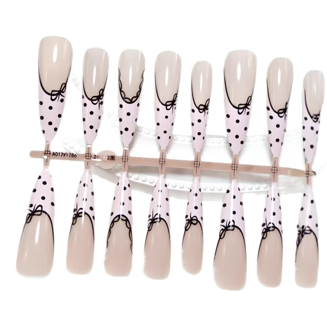 Elegant artificial nails with bow design and dots Kalsten