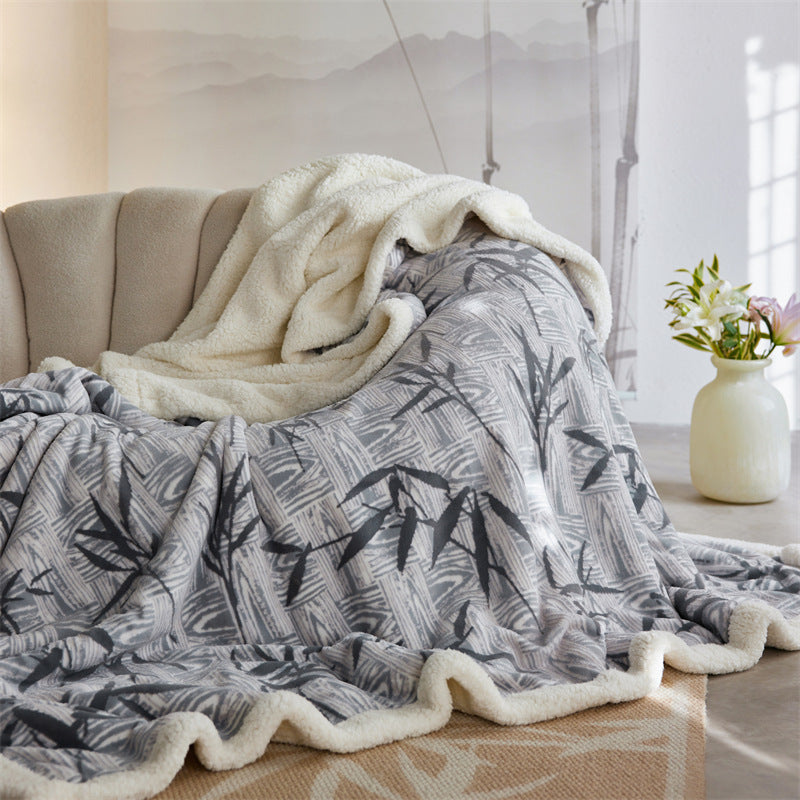 Cozy throw blanket with Sherpa lining and jacquard pattern
