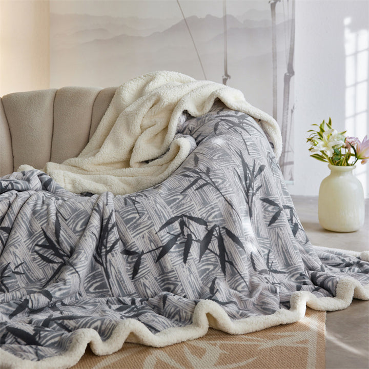 Cozy throw blanket with Sherpa lining and jacquard pattern