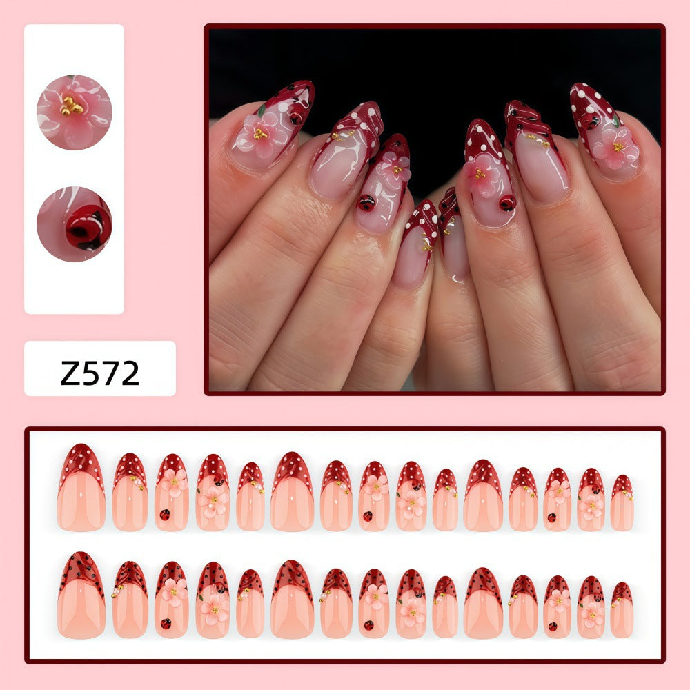 Artificial nails with floral design and 3D accents Kalsten