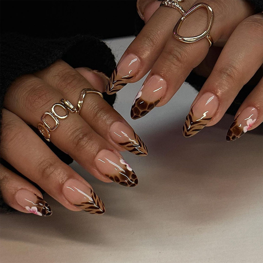 Artful Stiletto nails with floral accent Kalsten