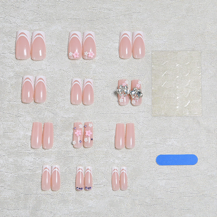 Artificial nails with floral accents and glitter effects Kalsten