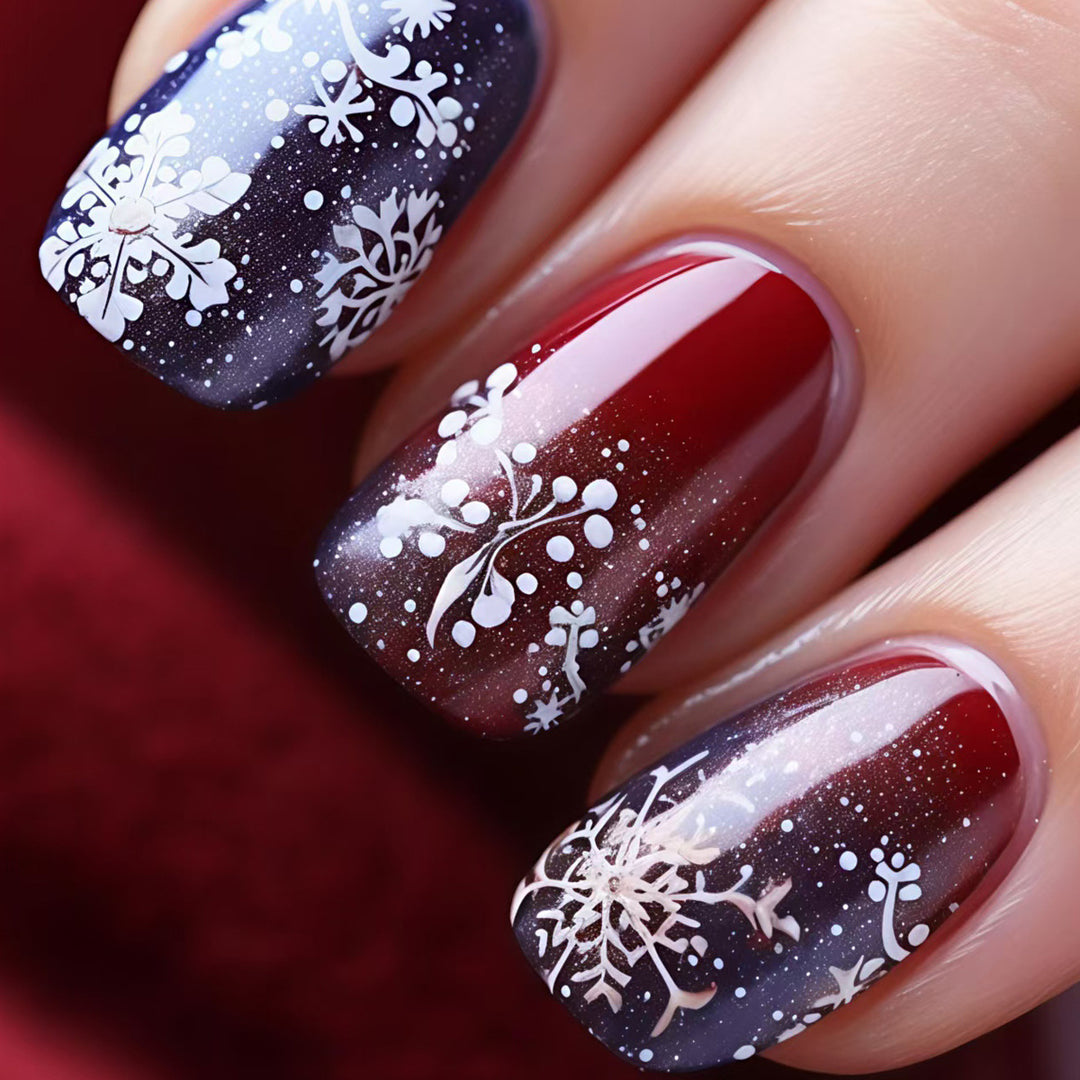 Artificial nails with festive glitter effect and wintry snow motif Kalsten
