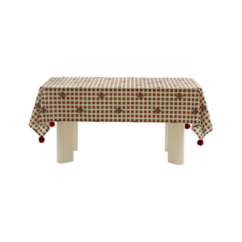 Rectangular decorative tablecloth with checkered pattern, pompom trim, and fine embroidered applique Kalsten