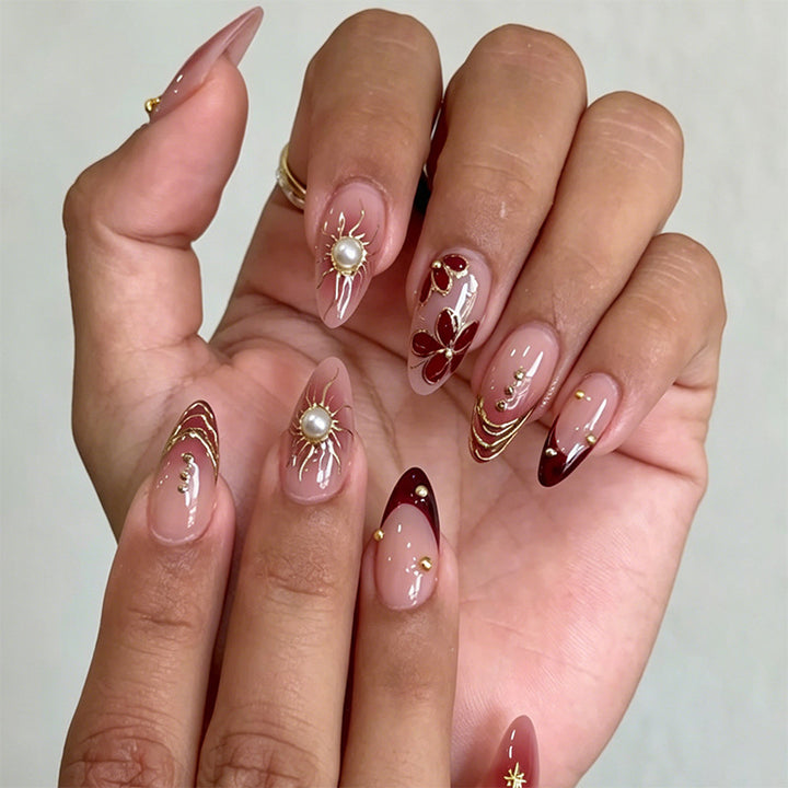 Artful nail set with floral accents Kalsten