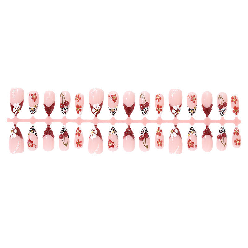 Artificial nail set with floral 3D designs and elegant accents Kalsten