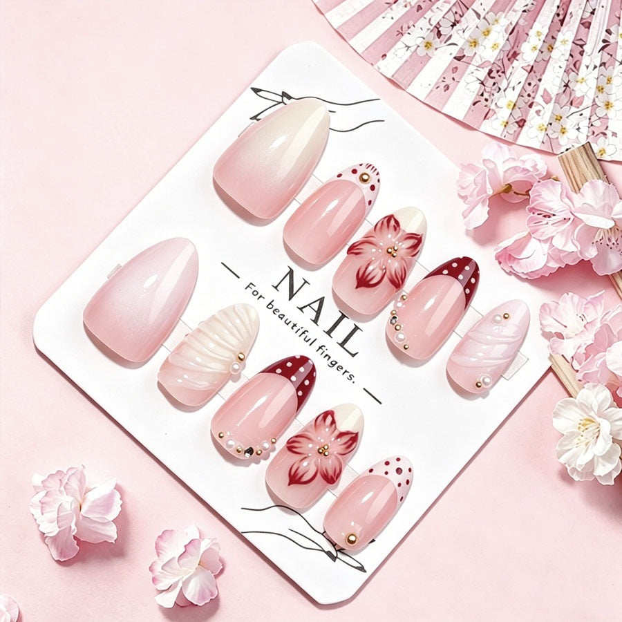 Artificial nail set with floral details and glitter accents Kalsten