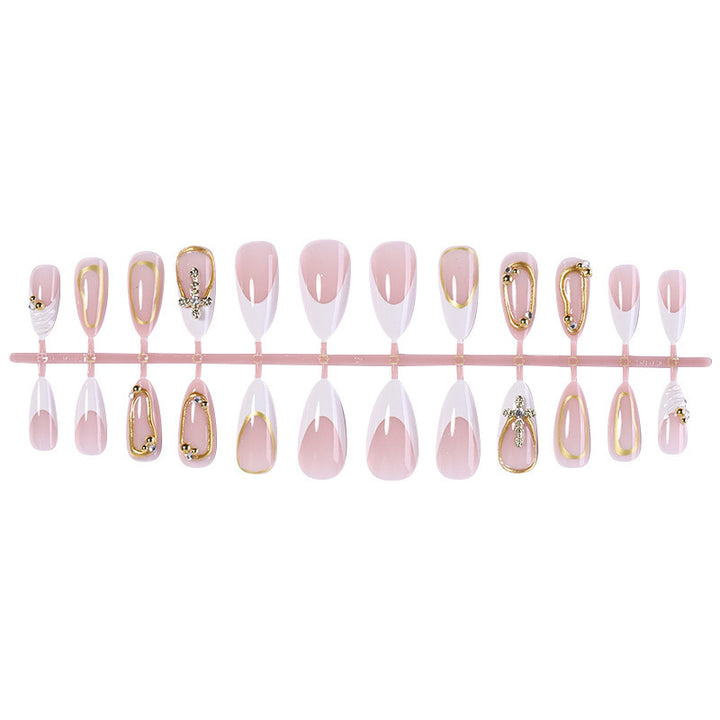 Artificial nail set with luxurious gold embellishments and elegant designs Kalsten