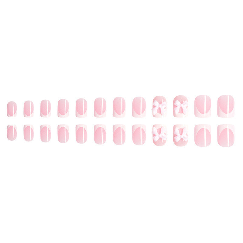 Artificial nails with cute bow designs Kalsten