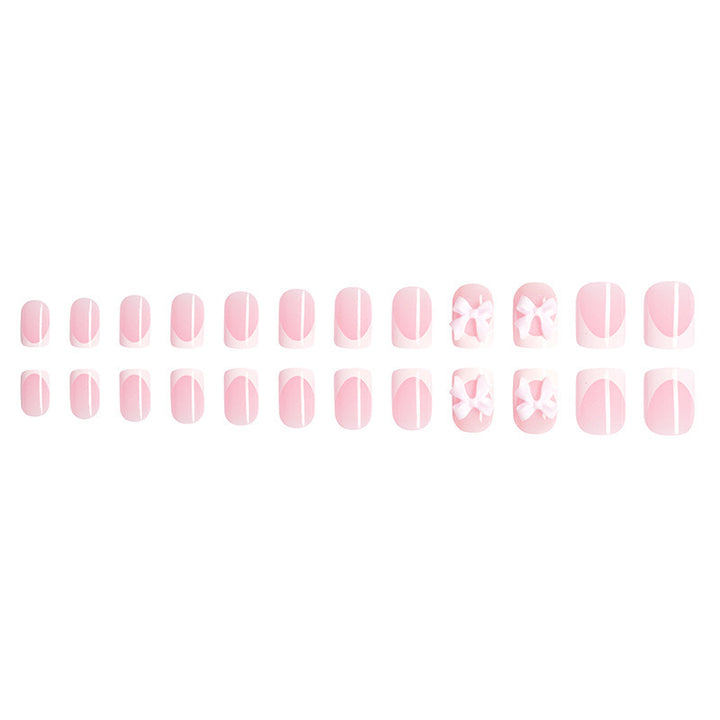 Artificial nails with cute bow designs Kalsten