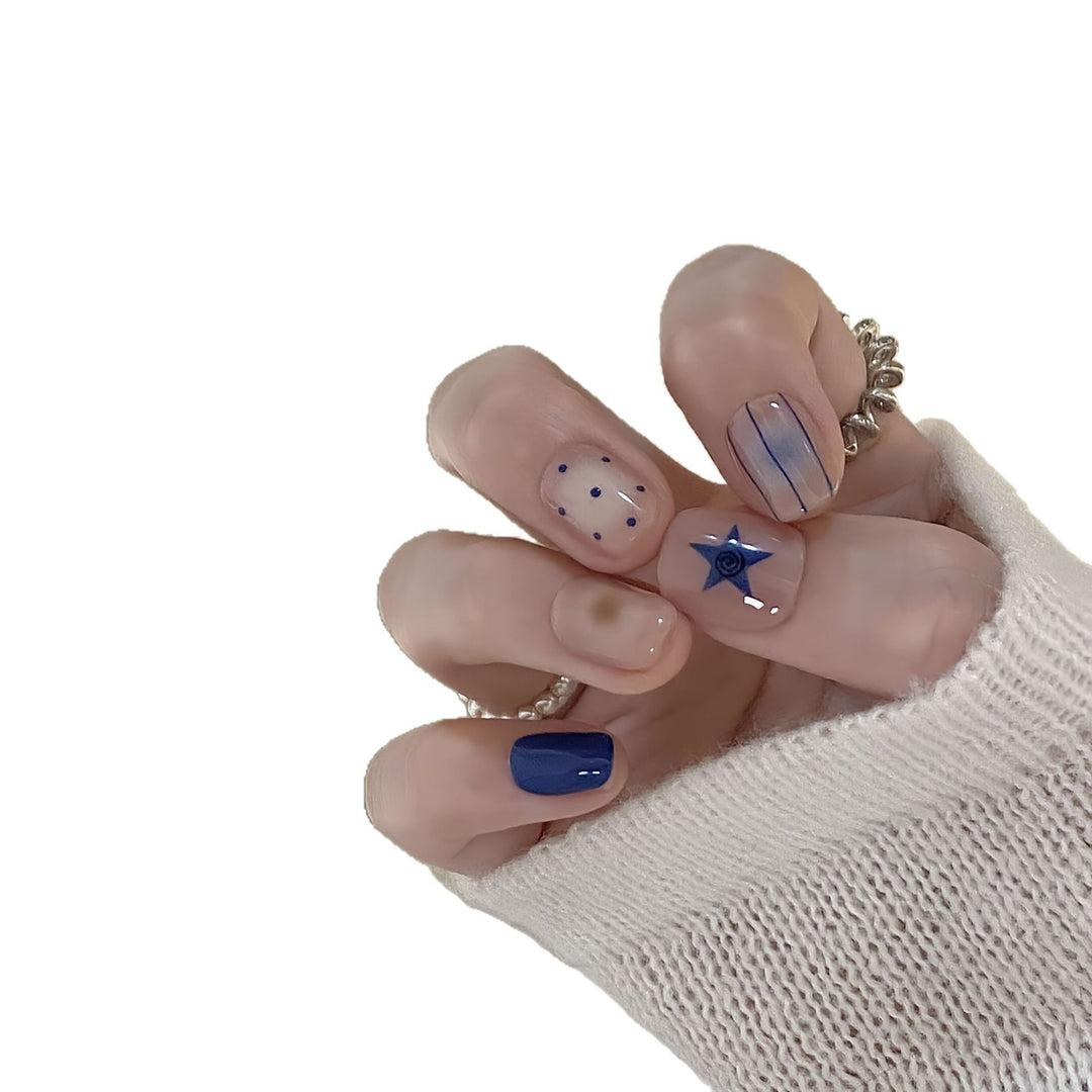 Artificial nails in modern design with geometric and sparkling accents Kalsten