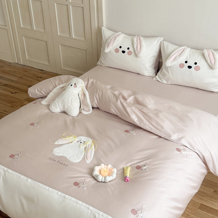 Cozy satin bedding with 3D rabbit appliqués