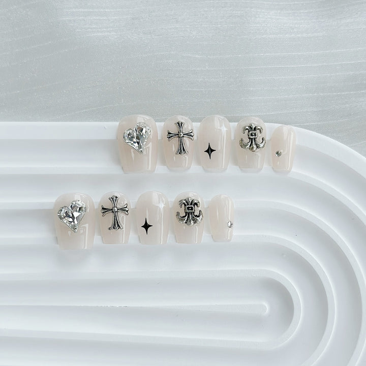 Artistic Press-On Nail Art Set with Heart and Celestial Designs