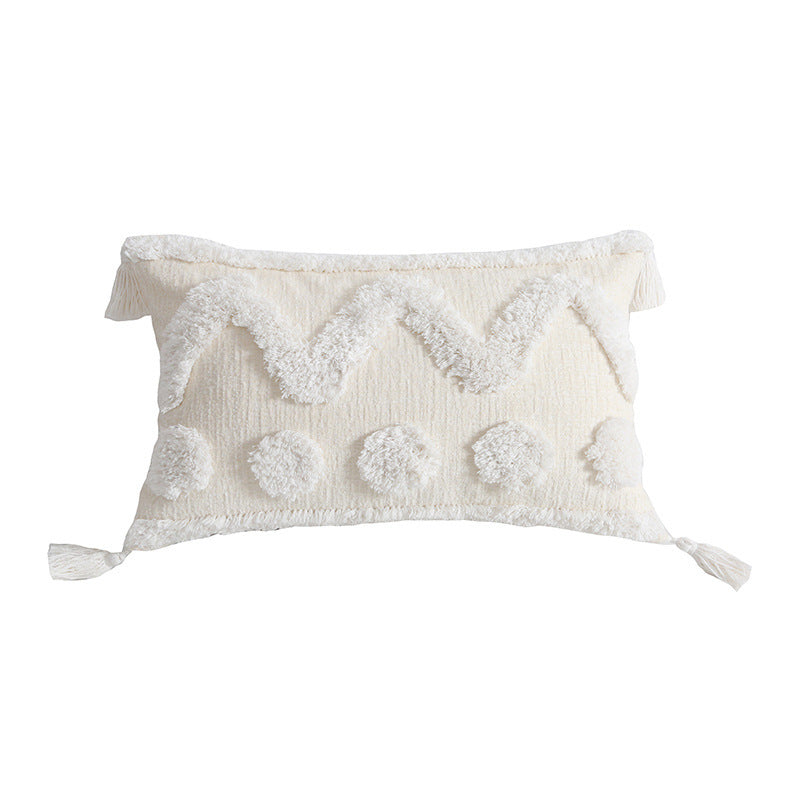 Rectangular decorative cushion cover with hand-tufted chevron and pompom relief as well as corner tassels Kalsten