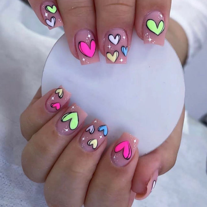Artificial nail set with playful heart patterns Kalsten
