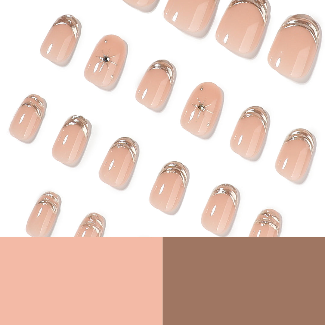 Glamorous nail extensions with elegant metallic accents Kalsten