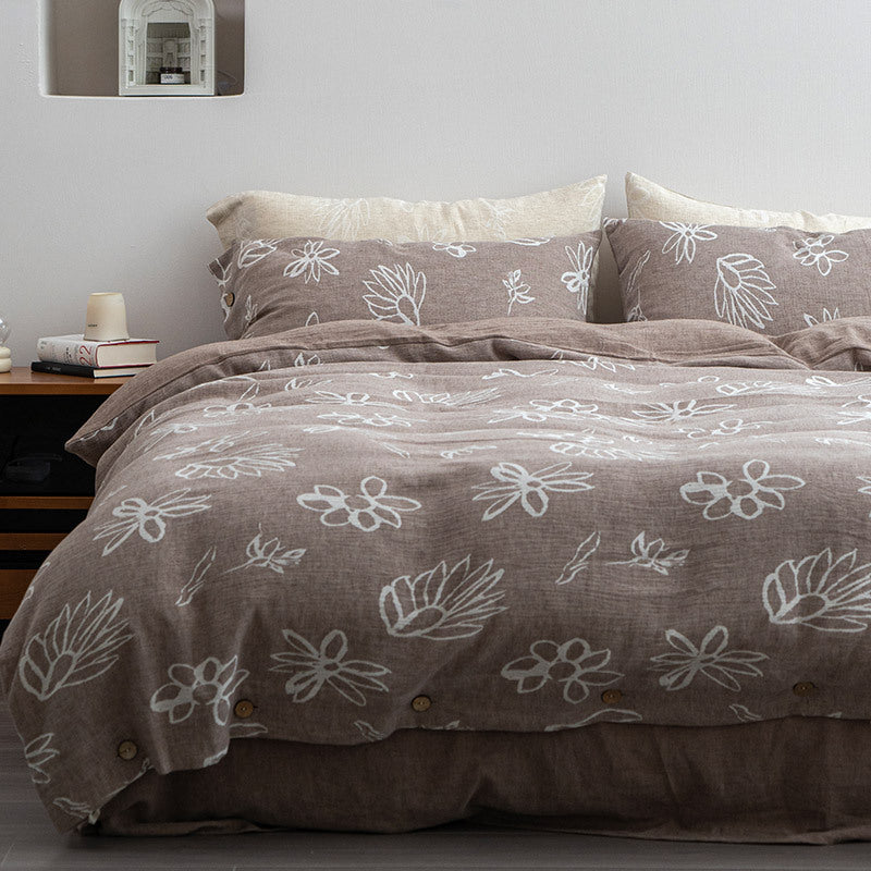 Linen look bedding set with floral print and wooden button closure