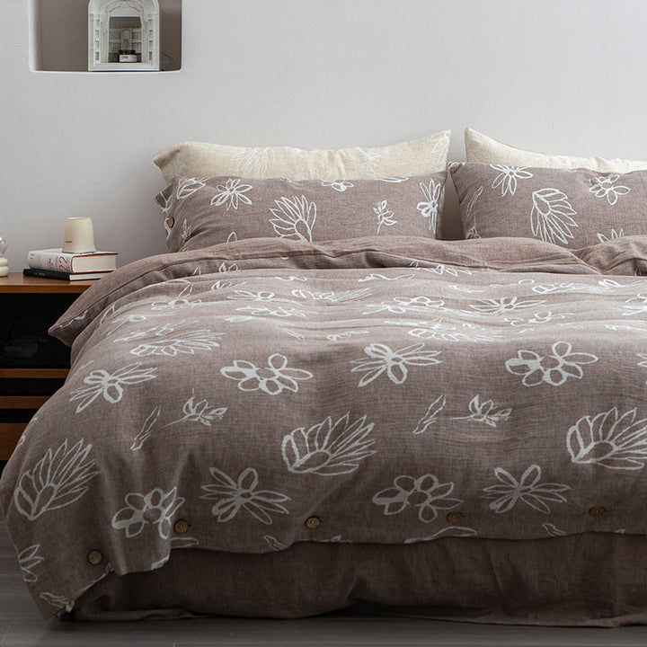 Linen look bedding set with floral print and wooden button closure