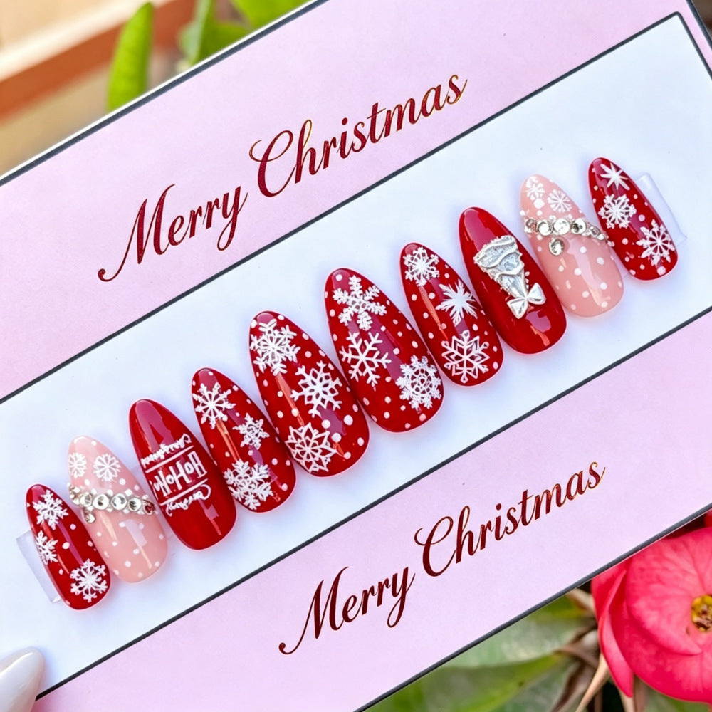 Artificial nails in festive Christmas design Kalsten