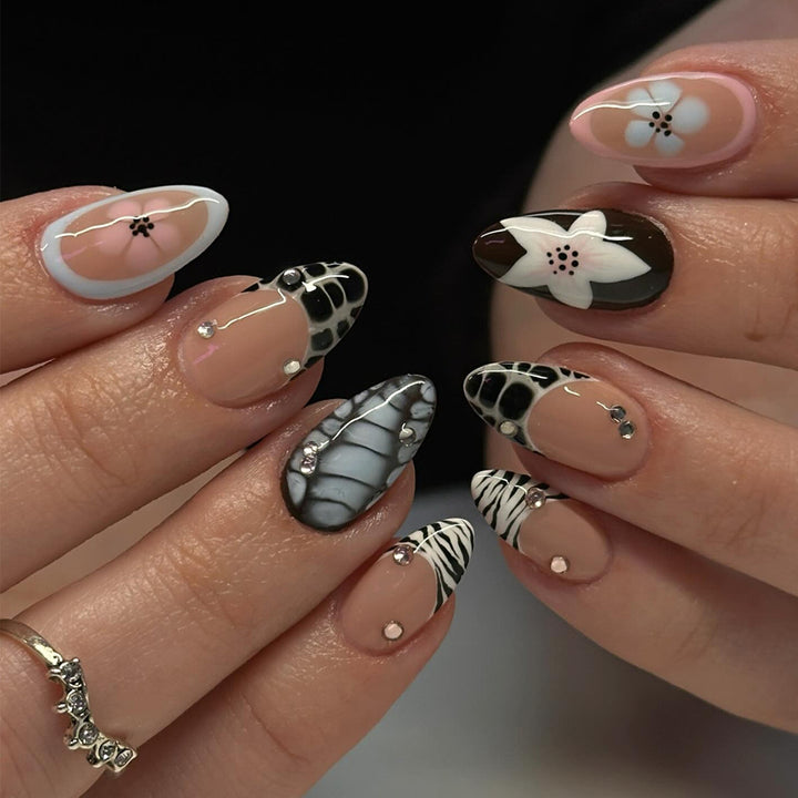 Nail art with elegant designs and embellishments Kalsten