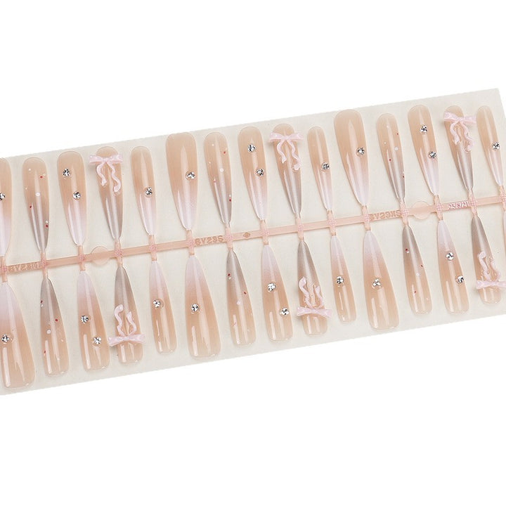 Elegant Stiletto Press-On Nails with Decorative Bow and Rhinestone Accents Kalsten