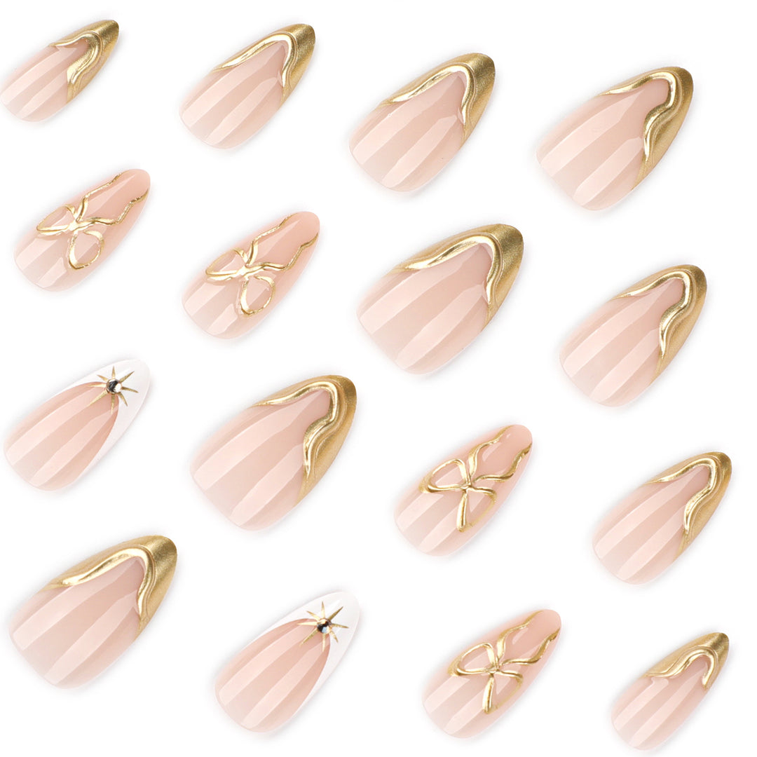 Artistic stiletto nails with elegant gold accents Kalsten