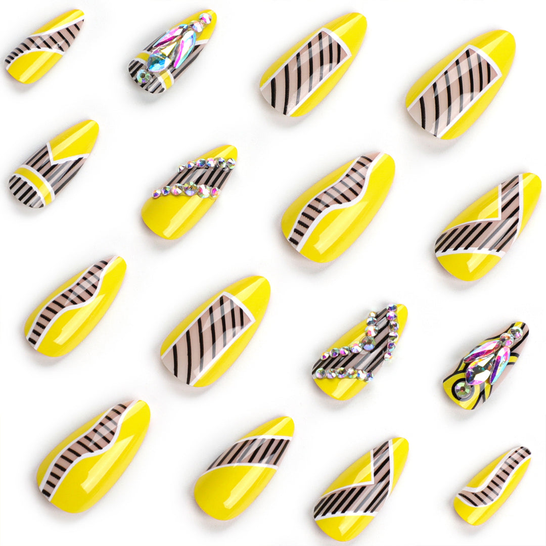 Artful nail extensions with geometric design and glitter accents Kalsten