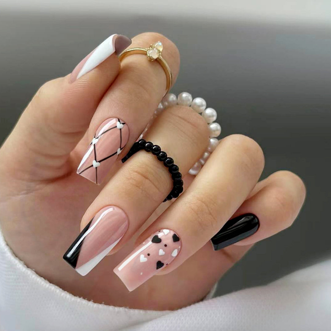 Artful nail art with heart patterns Kalsten