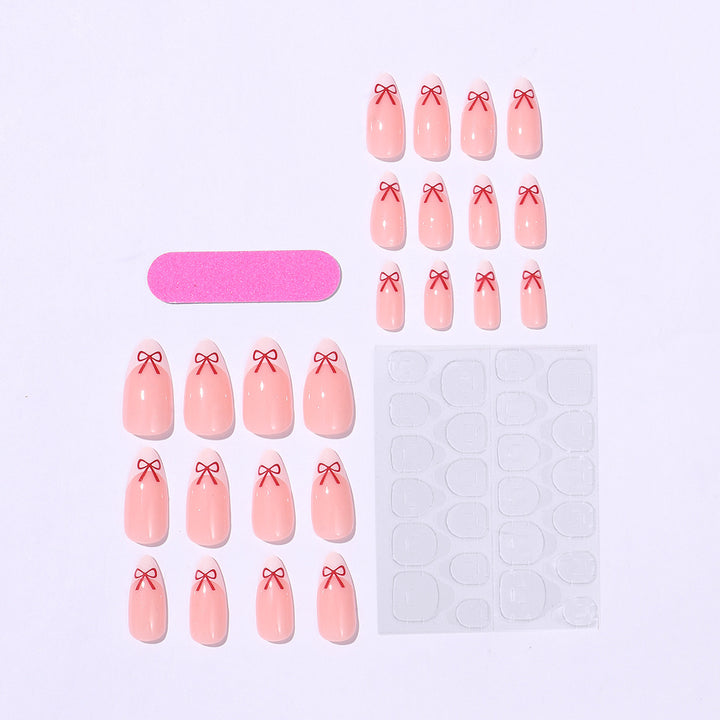 Artificial nail set with playful bow design Kalsten