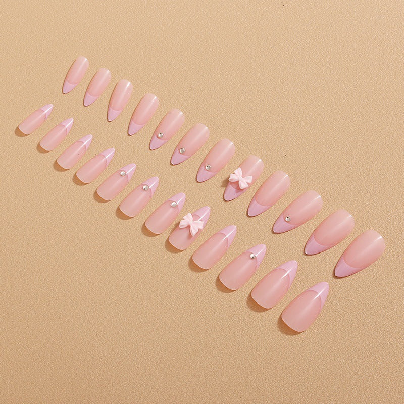 Glamorous nail art with bow detail Kalsten