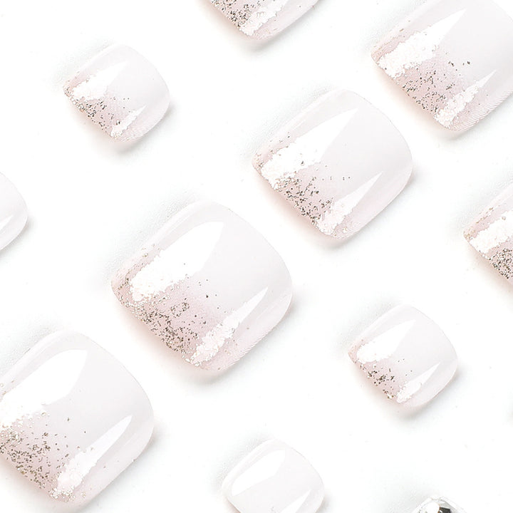 Artful toenail design with sparkling embellishments Kalsten