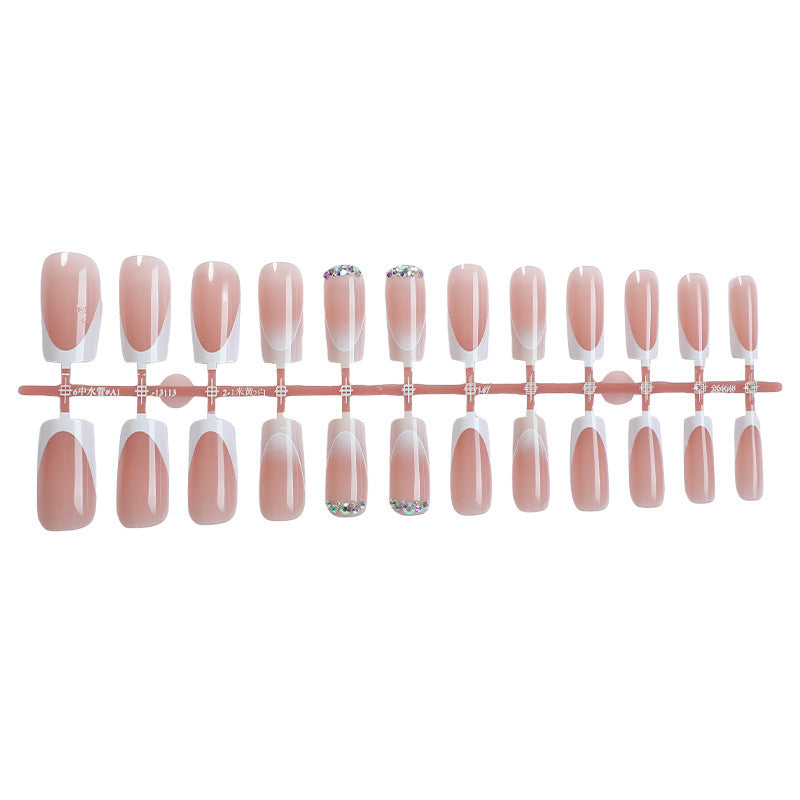 Acrylic nail set with elegant color gradients and glitter details Kalsten