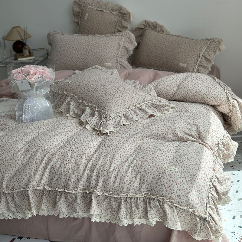 Duvet and pillowcase set made of cotton cambric with ruffles and eyelet embroidery