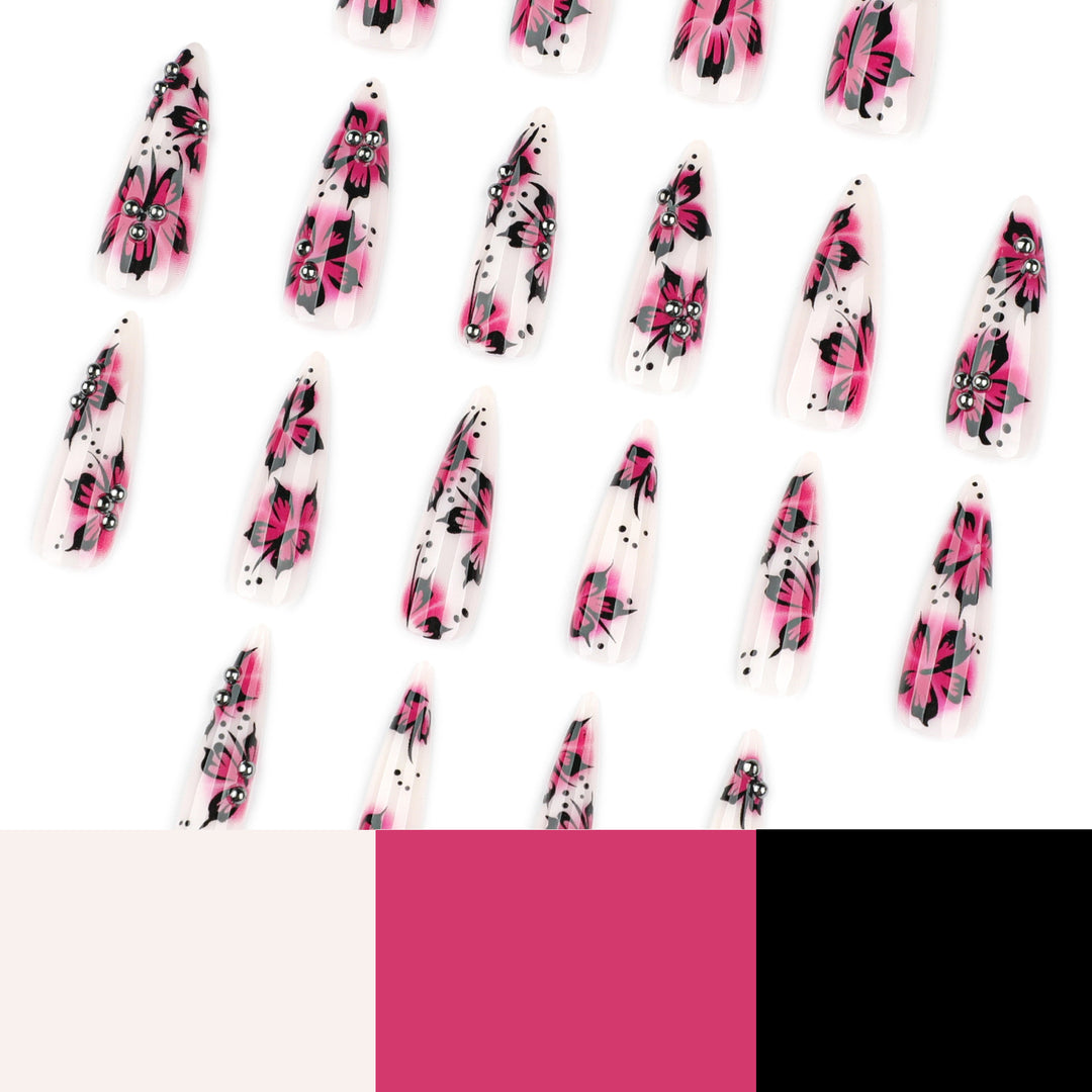 Artful nail art with floral design and rhinestone accents Kalsten