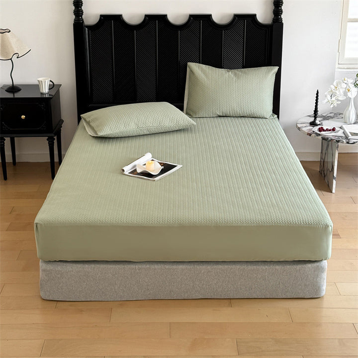 Comfort mattress topper with textured waffle surface and deep edge