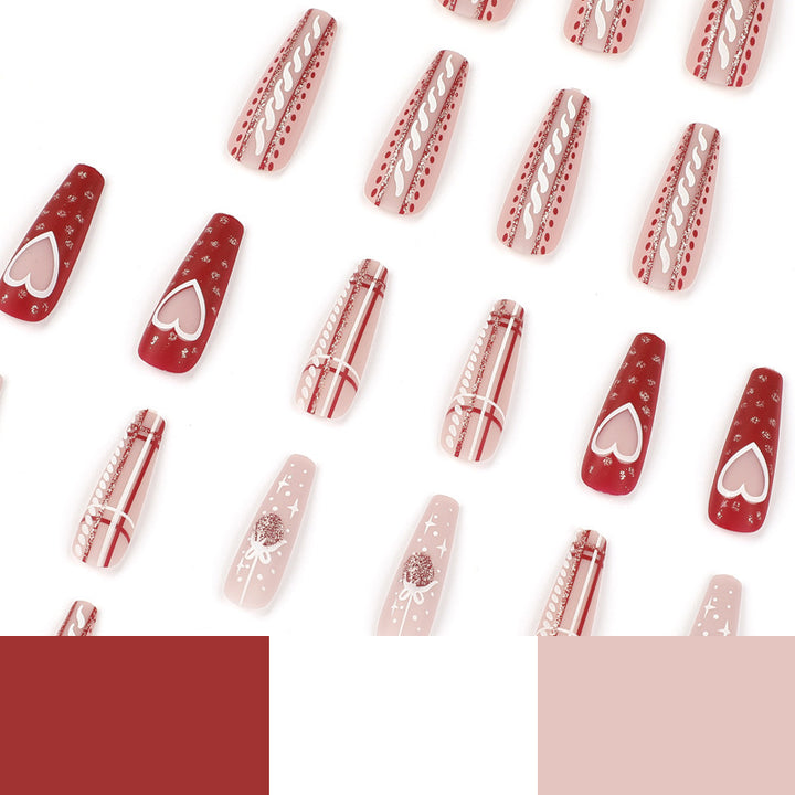 Artful nail art in festive design with heart and Christmas motifs Kalsten