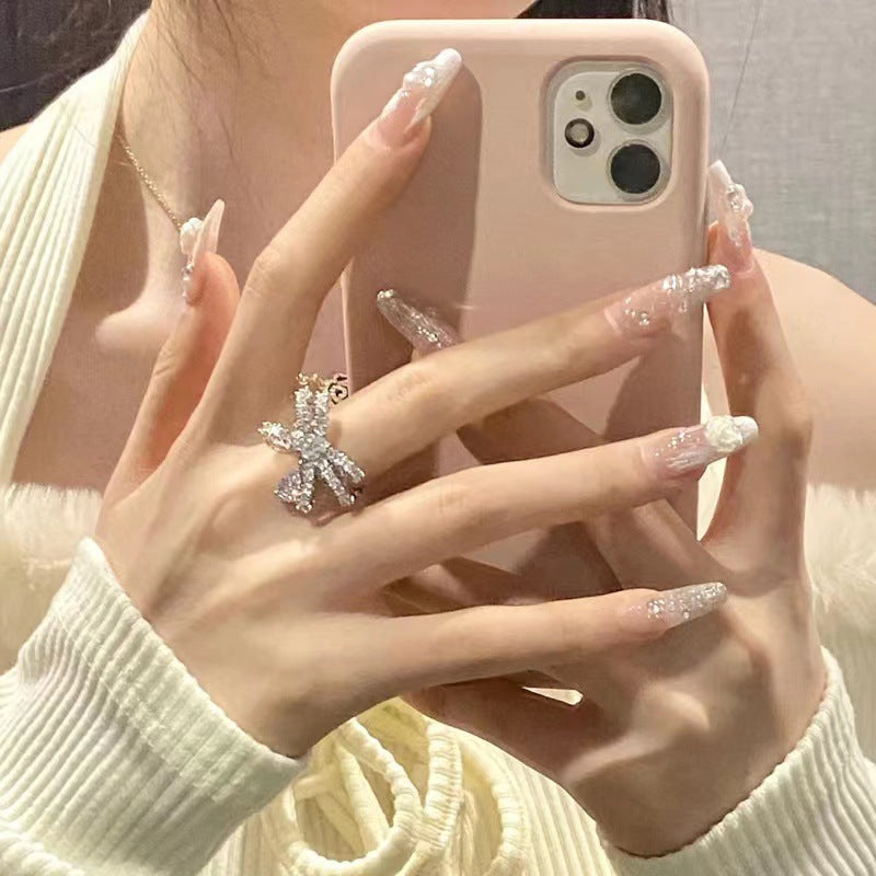 Elegant artificial nails with glitter and flower decoration Kalsten