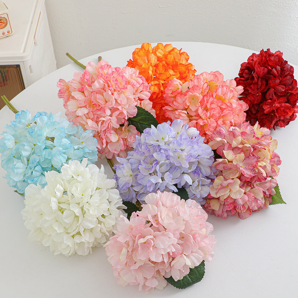 Artificial flower branch with realistic flowers