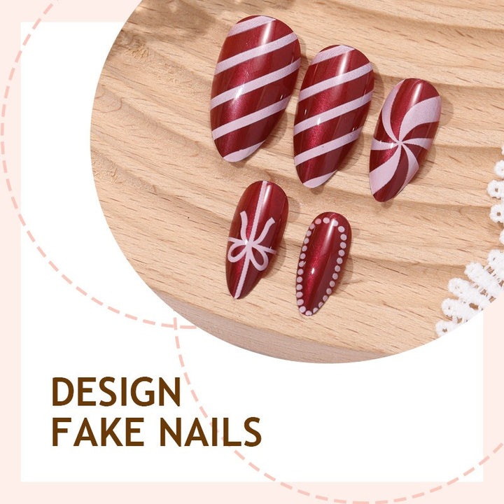 Creative nail art set with festive caramel and stripe designs Kalsten